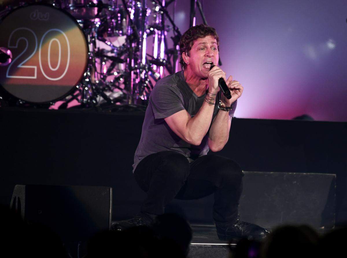 Drenched in sweat, Rob Thomas performs with Matchbox 20 on their “Slow Dream Tour” to Raleigh, N.C.’s Coastal Credit Union Music Park at Walnut Creek, Wednesday night, July 12, 2023.
