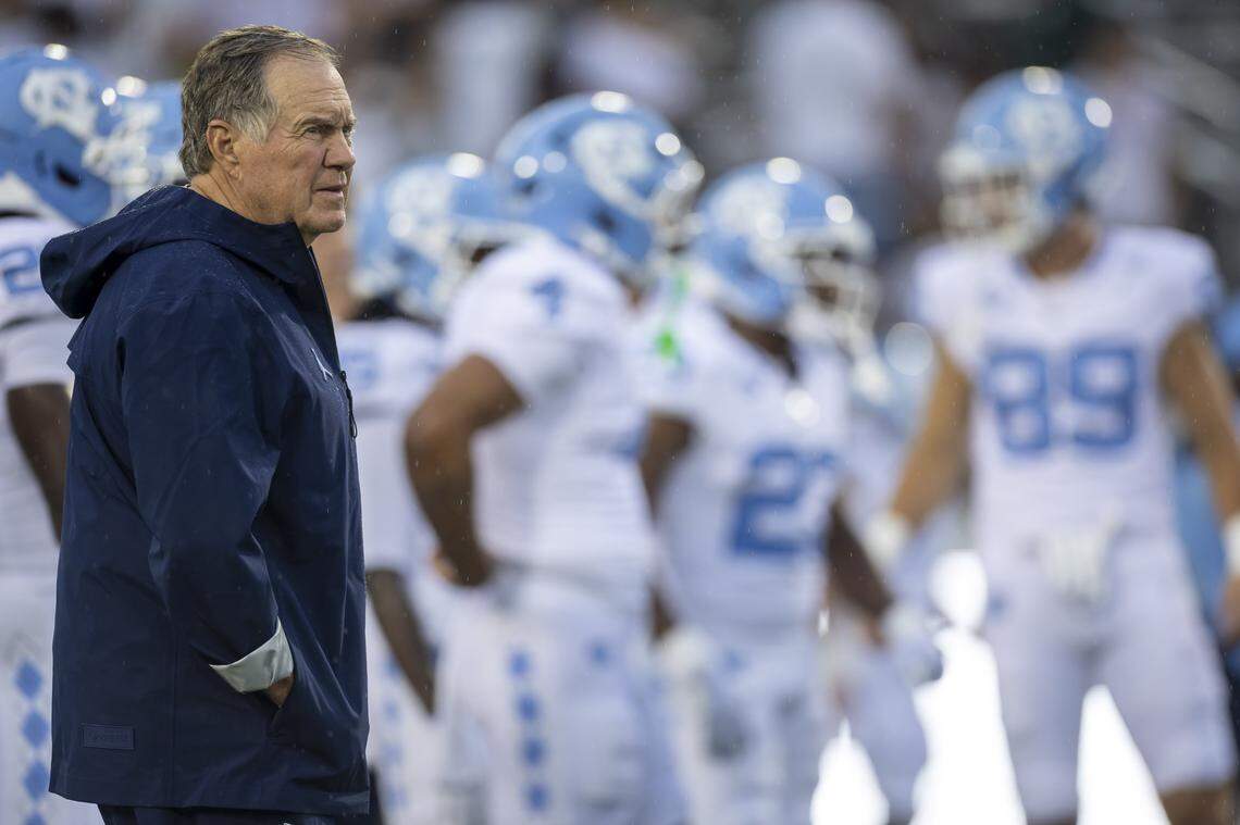 North Carolina coach Bill Belichick watches the Tar Heels’ warm up for their game against UNC Charlotte on Saturday, September 6, 2025 at Jerry Richardson Stadium in Charlotte, N.C. 