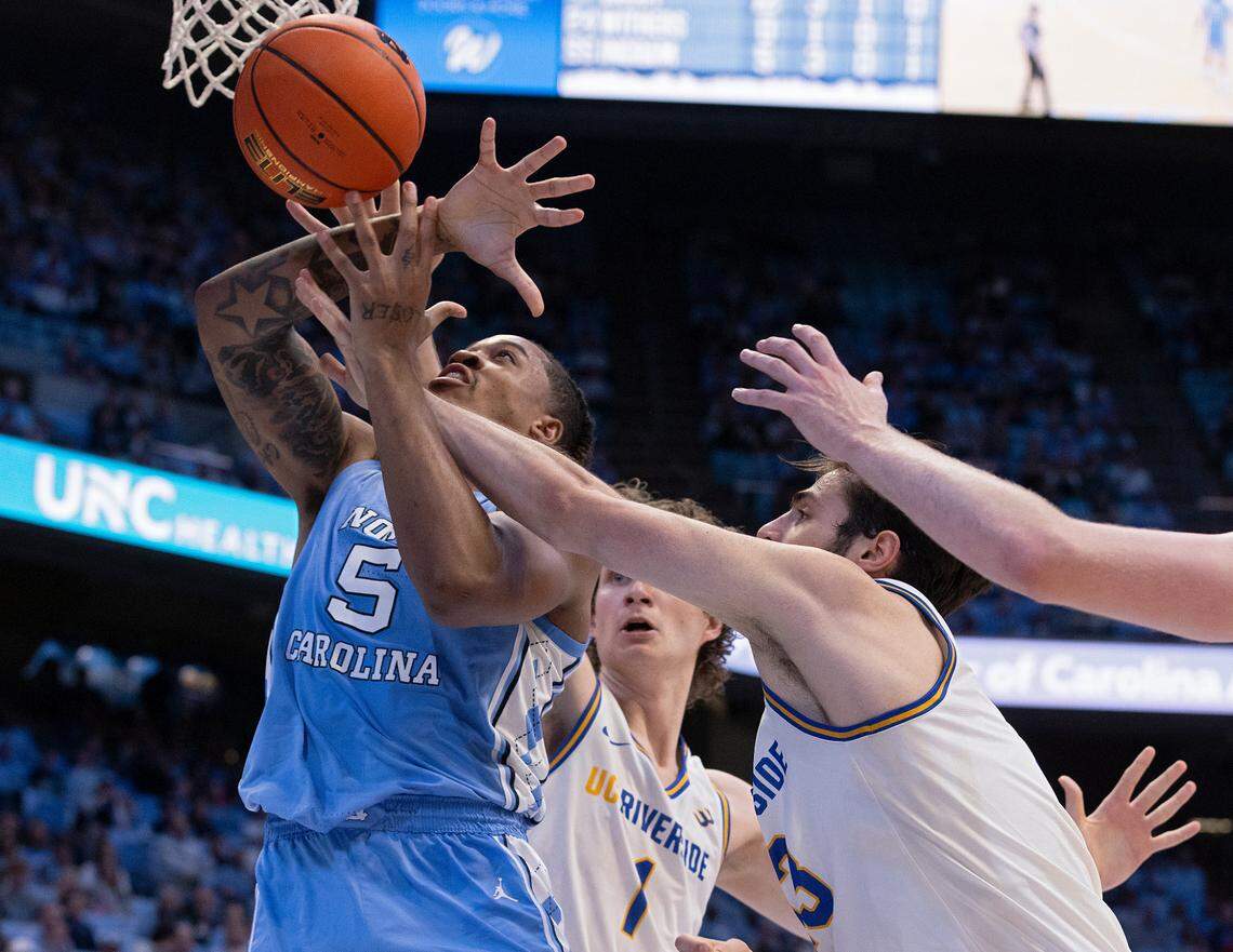 North Carolina’s Armando Bacot drives to the basket past UC Riverside’s Benjamin Griscti and Vladimer Salaridze during the first half of the Tar Heels’ 77-52 win on Friday, Nov. 17, 2023, at the Smith Center in Chapel Hill, N.C.