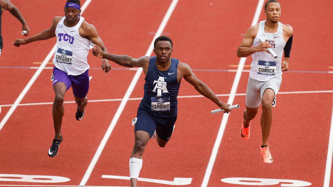 North Carolina A&T’s Javonte Harding crosses the finish line as the team qualifies in a heat of the men’s 4x100 relay at the NCAA Division I Outdoor Track and Field Championships, Wednesday, June 9, 2021, at Hayward Field in Eugene, Ore. (AP Photo/Thomas Boyd)