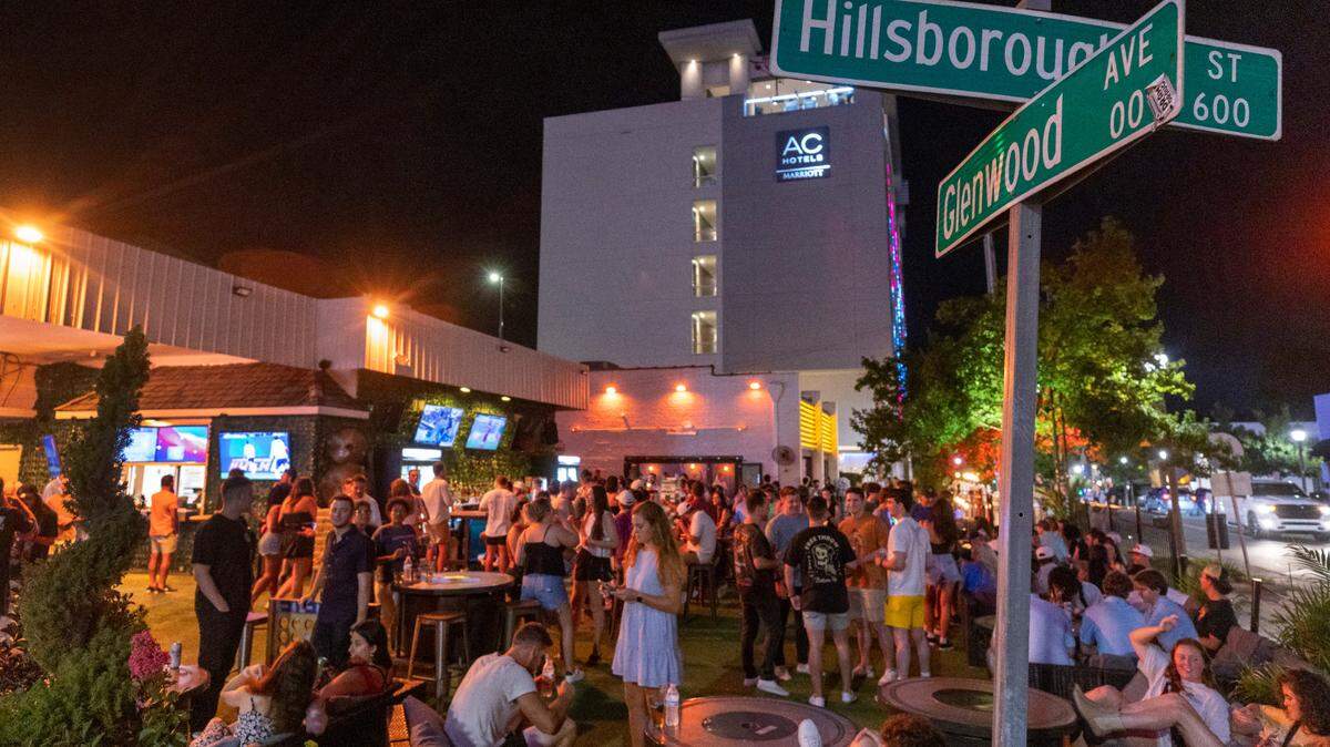 The Avenue at the corner of Glenwood Avenue and Hillsborough Street is packed on Friday July 21, 2023 in Raleigh, N.C. The popular bar located in the former Snoopy’s location has transformed the parking lot into a popular outdoor gathering spot.