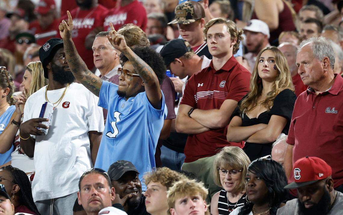 A North Carolina fan celebrates a Tar Heel touchdown during the second half of UNC’s 31-17 victory over South Carolina in the Duke’s Mayo Classic at Bank of America Stadium in Charlotte, N.C., Saturday, Sept. 2, 2023.