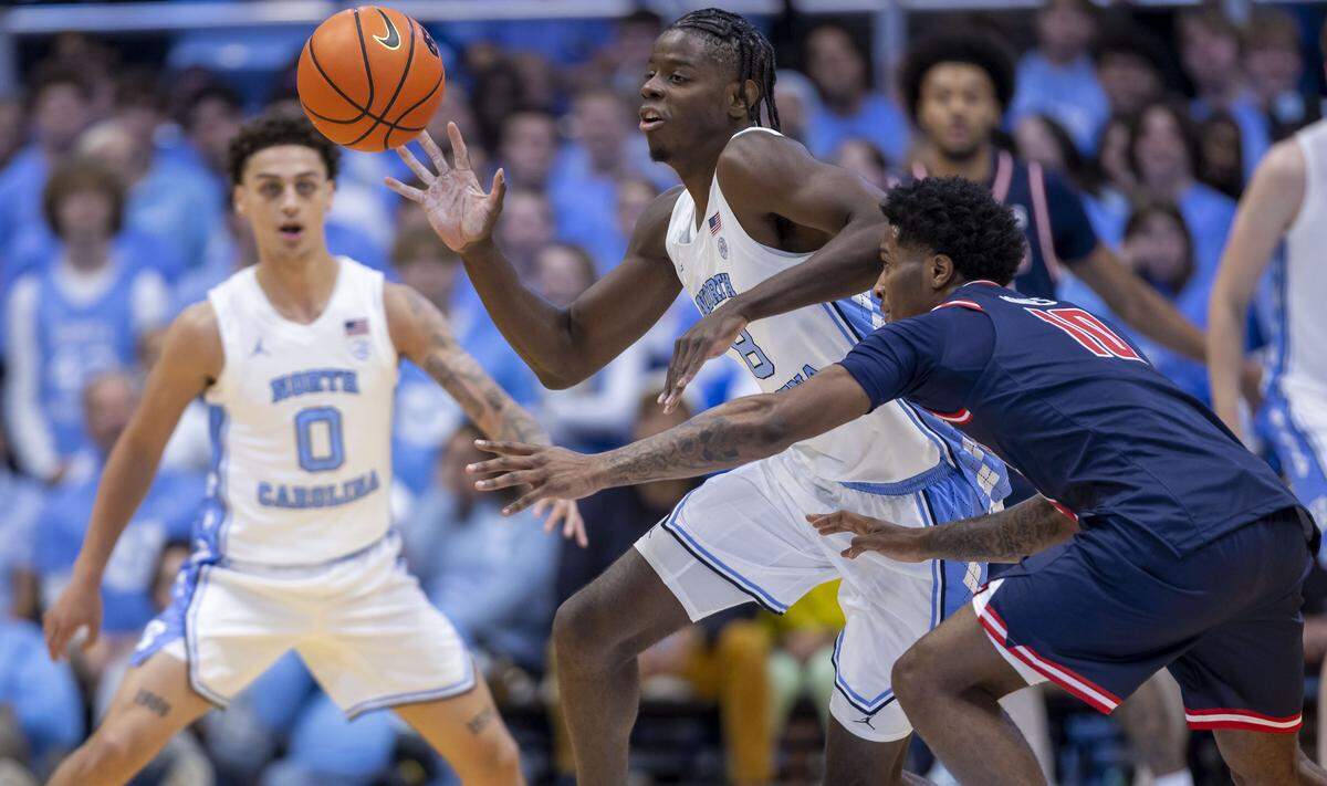 North Carolina forward Caleb Wilson makes a steal from Radford guard Del Jones (10) in the first half on Tuesday, November 11, 2025 at the Smith Center in Chapel Hill, N.C.