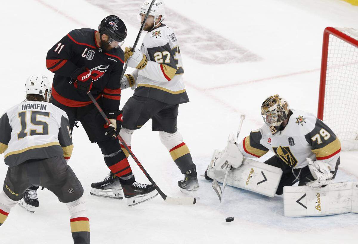 Carolina's Jordan Staal (11) can’t deflect the puck past Vegas’ Carter Hart (79) in the second period of the Hurricanes’ game against the Golden Knights in the second game of the Stanley Cup Final at the Lenovo Center in Raleigh, N.C., Thursday, June 4, 2026.