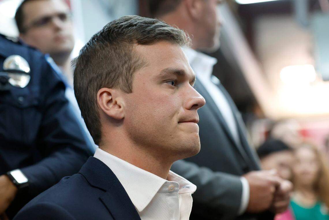 Rep. Madison Cawthorn listens to a question while speaking to the media and supporters at his election campaign headquarters in Hendersonville, N.C., Tuesday, May 17, 2022.