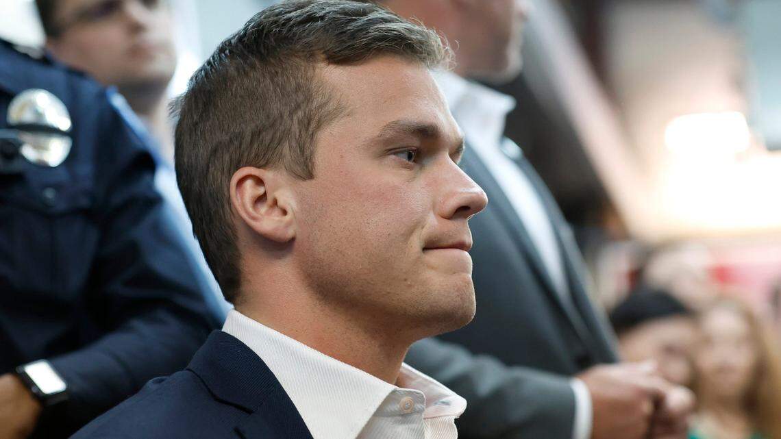 Rep. Madison Cawthorn listens to a question while speaking to the media and supporters at his election campaign headquarters in Hendersonville, N.C., Tuesday, May 17, 2022.