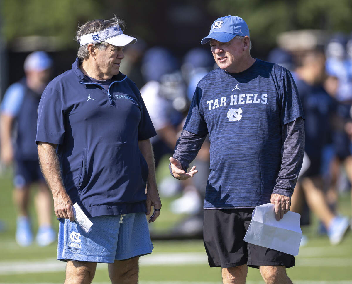 North Carolina offensive coordinator Bobby Petrino talks with head coach Bill Belichick during practice, on Thursday, July 30, 2026 in Chapel Hill, N.C.