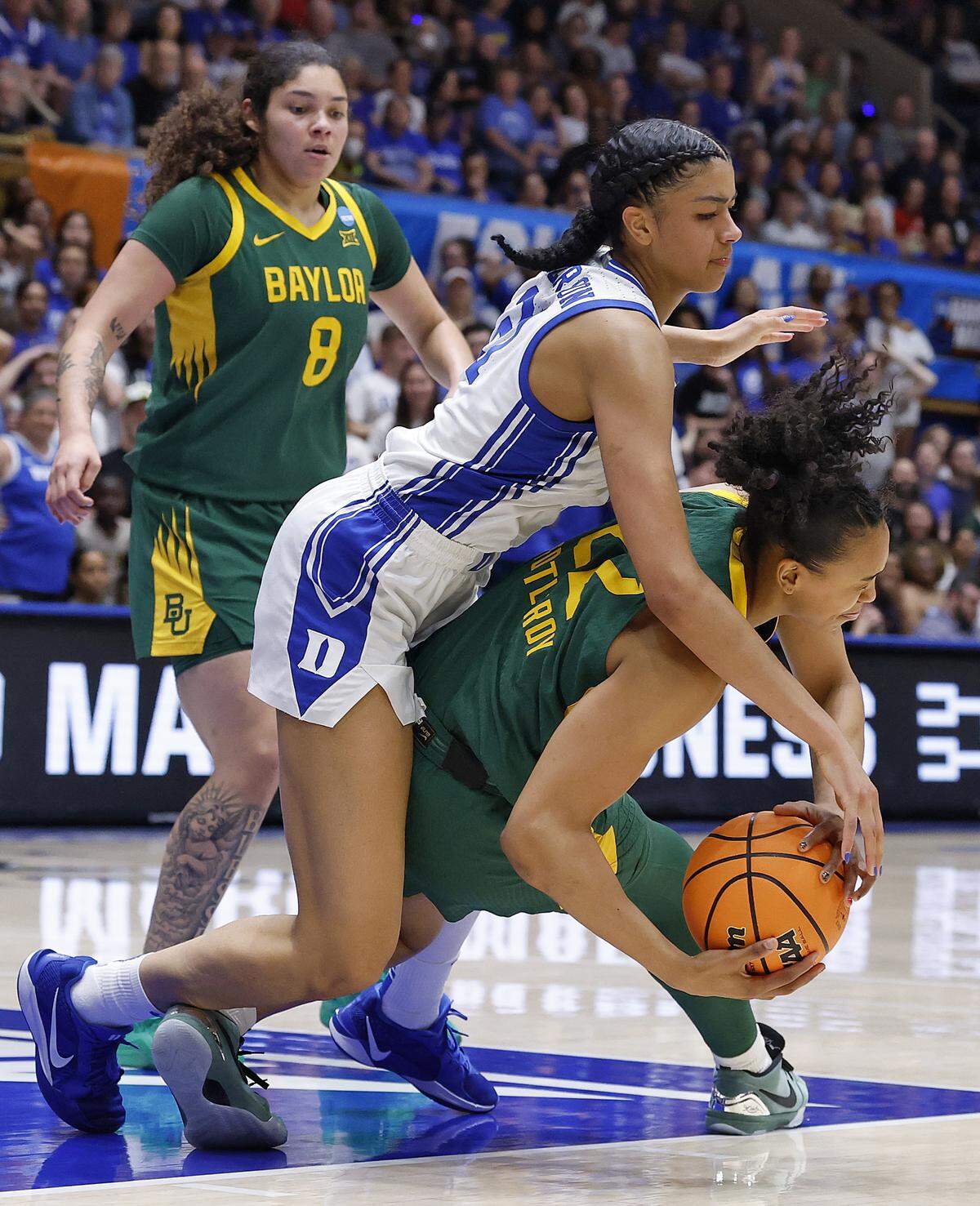 Duke’s Arianna Roberson battles Baylor’s Bella Fontleroy for a loose ball during the second half of the Blue Devils’ 69-46 second-round NCAA Tournament win on Sunday, March 22, 2026, at Cameron Indoor Stadium in Durham, N.C.