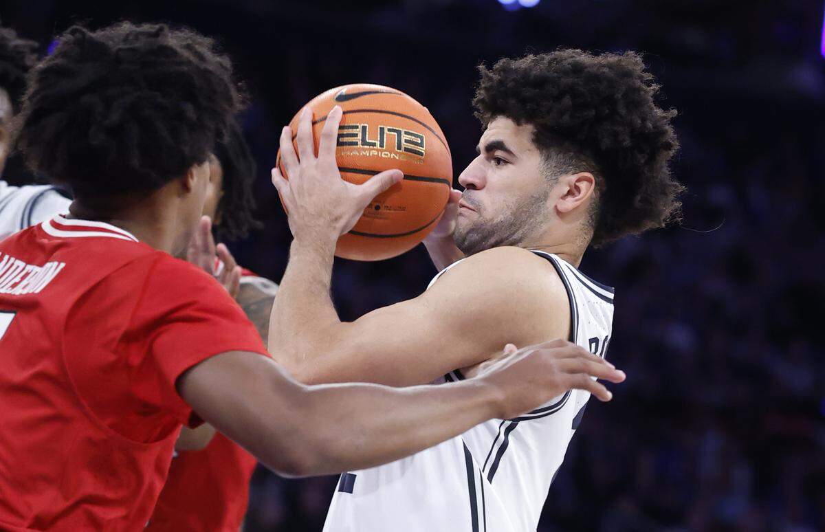 Duke’s Cayden Boozer (2) drives to the basket during the first half of Duke’s game against Texas Tech in the SentinelOne Classic at Madison Square Garden in New York City, N.Y., Saturday, Dec. 20, 2025.