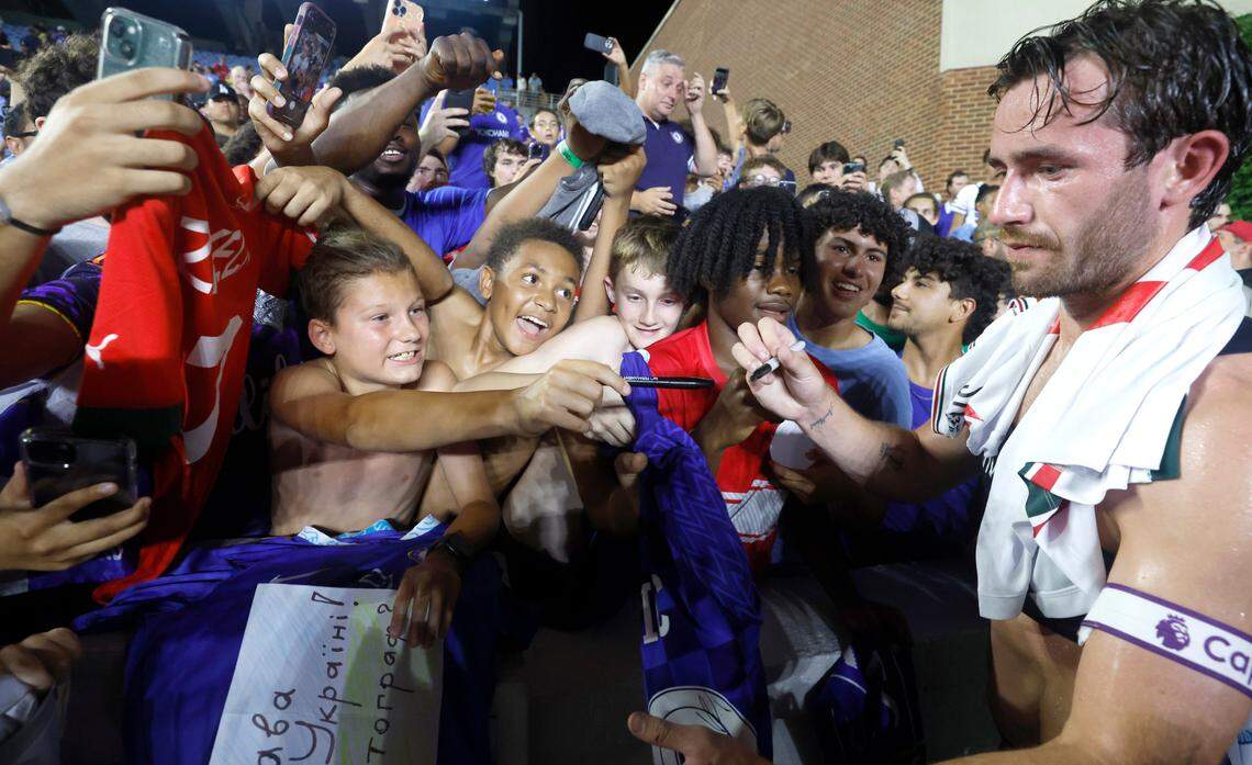 Fans try to get the autograph of Chelsea’s Ben Chilwell after Chelsea Football Club’s 5-0 victory over Wrexham AFC in a friendly match at Kenan Stadium in Chapel Hill, N.C., Wednesday, July 19, 2023.
