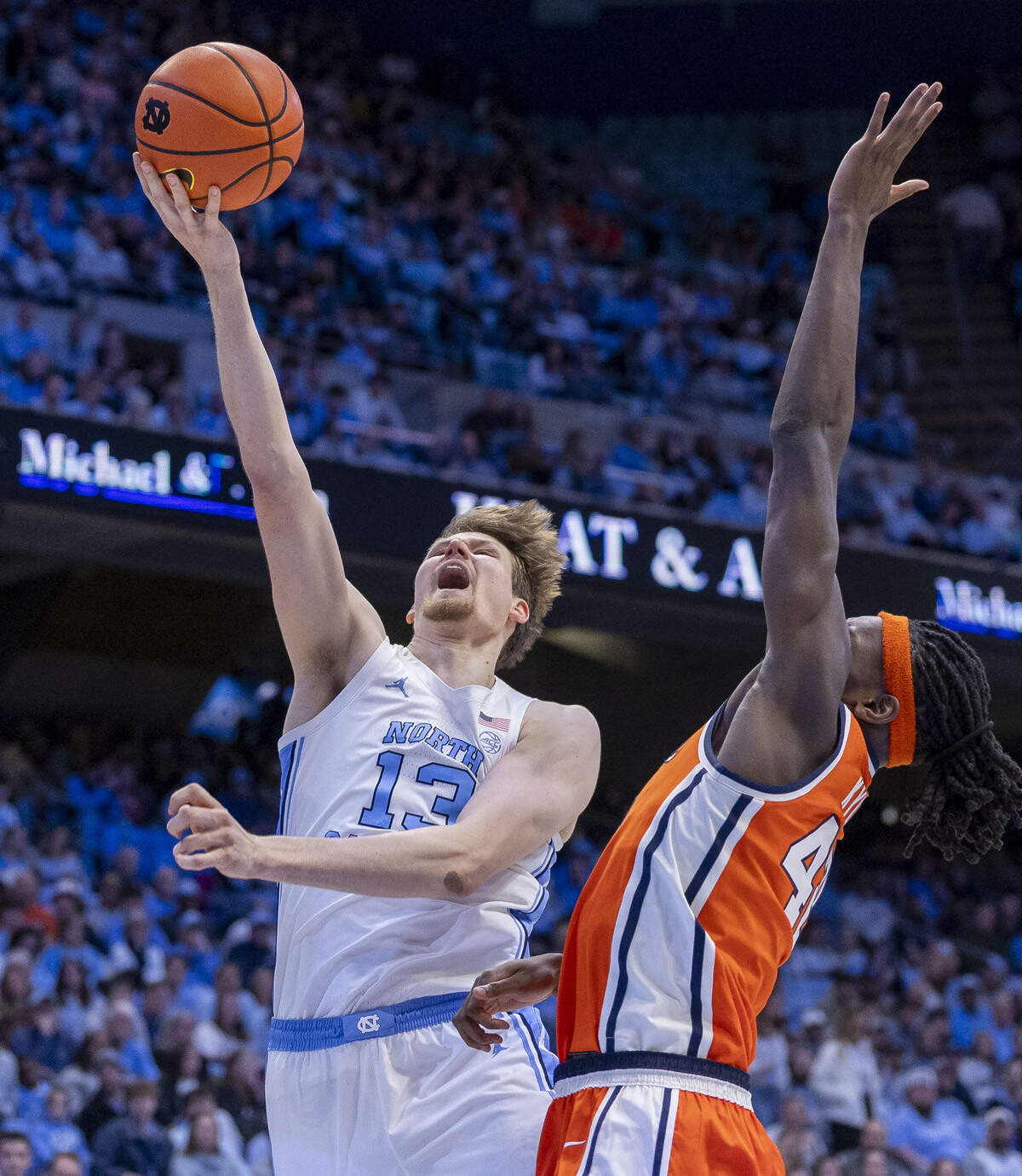 North Carolina center Henri Veesaar (13) puts up a shot against Syracuse forward William Kyle III (42) in the first half on Monday, February 2, 2026 at the Smith Center in Chapel Hill, N.C.