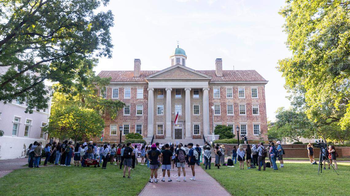 Pro-Palestinian demonstrators rally outside UNC-Chapel Hill’s South Building on Thursday, Aug. 22, 2024. The campus chapter of Students for Justice for Palestine hosted a “disorientation” event, drawing dozens of demonstrators.