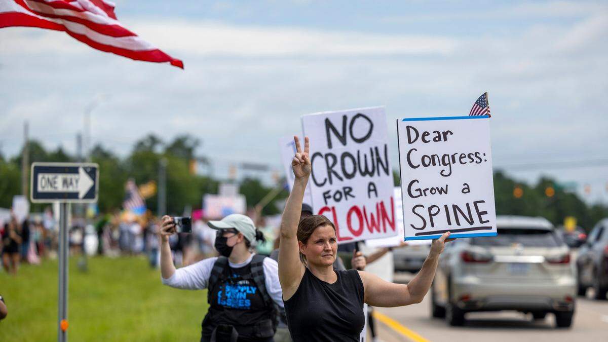 More than 1500 demonstrators lined Capital Boulevard to protest the policies and tactics of the of President Donald Trump on Saturday, June 14, 2025 near Triangle Town Center in Raleigh. The Raleigh “No Kings” rally was one of dozens across North Carolina and hundreds nationwide on what organizers called a nationwide day of defiance against the Trump administration.