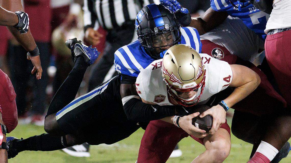 Duke’s Joshua Pickett sacks Florida State quarterback Luke Kromenhoek during the first half of the Blue Devils’ game on Friday, Oct. 18, 2024, at Wallace Wade Stadium in Durham, N.C.