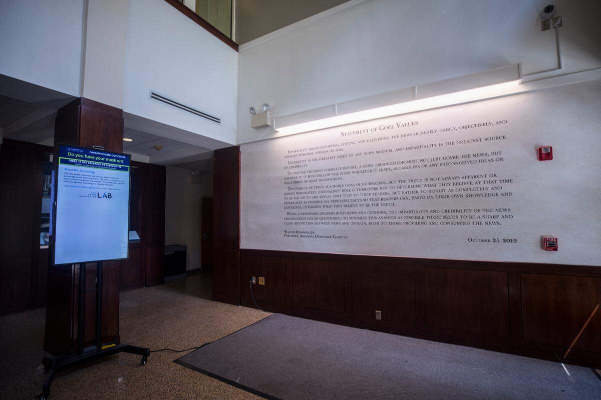 Walter Hussman Jr.’s “statement of core values” can be seen on the wall in the lobby of Carroll Hall in Chapel Hill, N.C., where the Hussman School of Journalism and Media is located, pictured here on Wednesday, July 14, 2021.