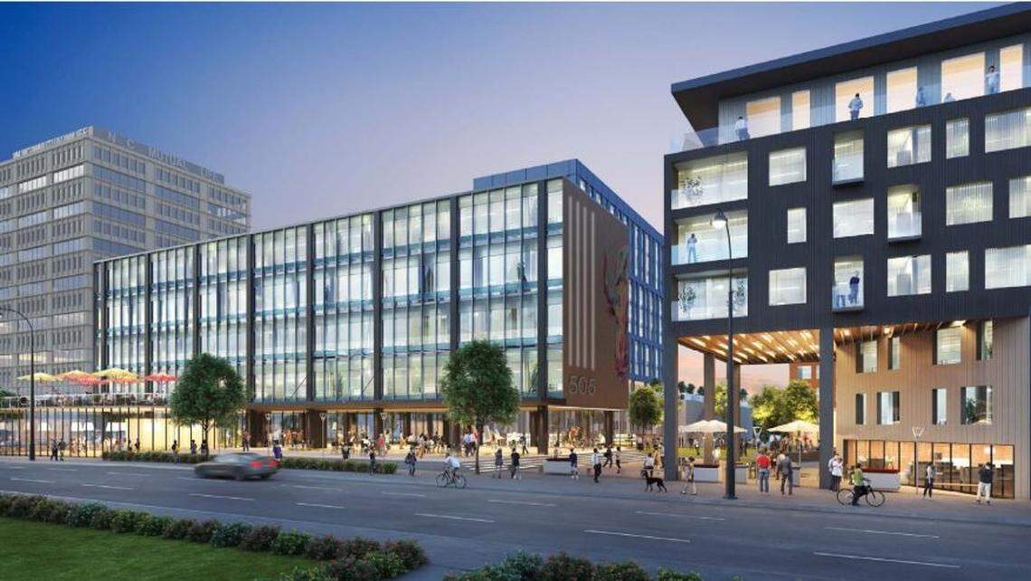 The plan for 505 W. Chapel Hill St. calls for 300 apartments (some of which can be seen on the right in this illustration) and a new commercial office building behind the old police headquarters. The NC Mutual building is seen on the far left.