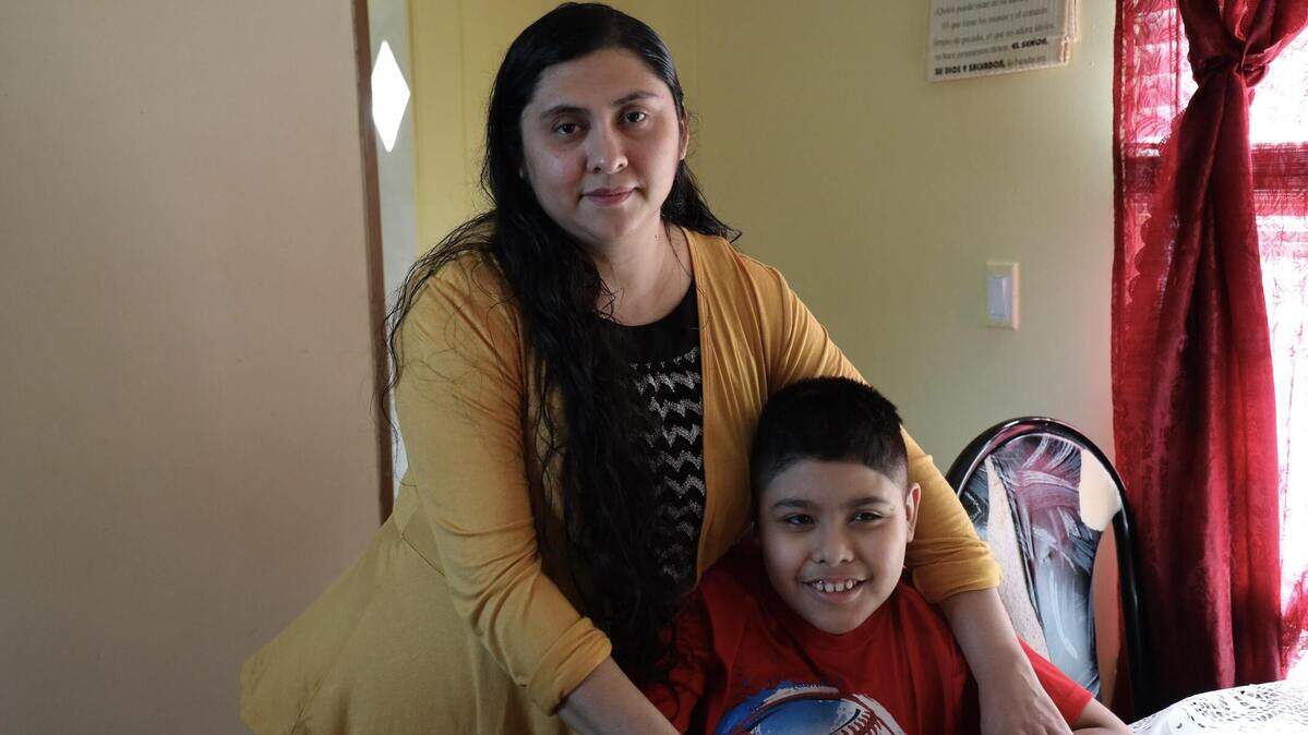 Gudelia Santana Ubaldo and her 9-year-old son, Sammy. Sammy has been diagnosed with global developmental delay, autism and mixed language disorders that prevent him from speaking. She is raising money to get him treatment that might help him.