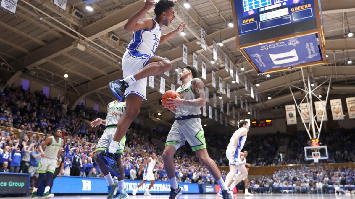 Duke’s Sean Stewart (13) celebrates after slamming in two during Duke’s 106-69 victory over Queens University at Cameron Indoor Stadium in Durham, N.C., Saturday, Dec. 30, 2023.
