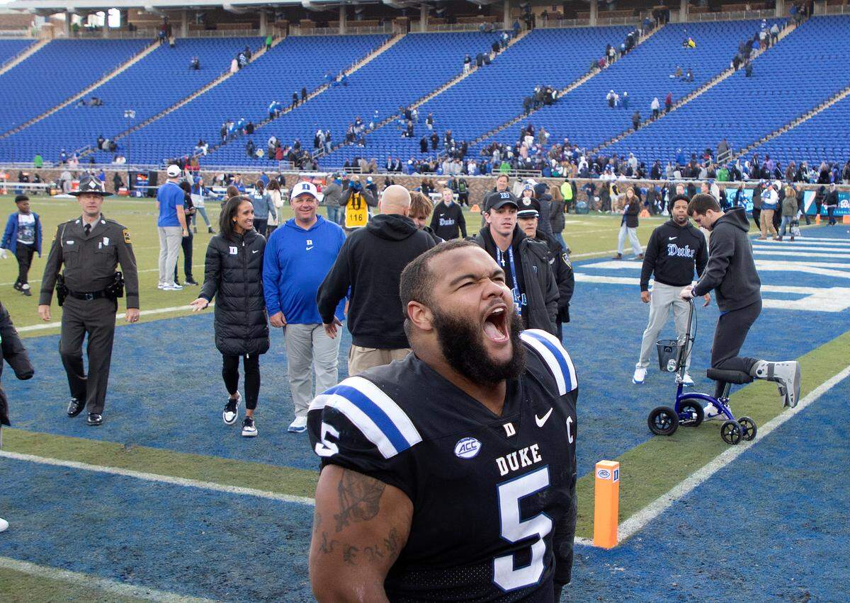 Duke’s Ja’Mion Franklin screams as he leaves the field following the Blue Devils’ 30-19 win over Pittsburgh on Saturday, Nov. 25, 2023, at Wallace Wade Stadium in Durham, N.C.