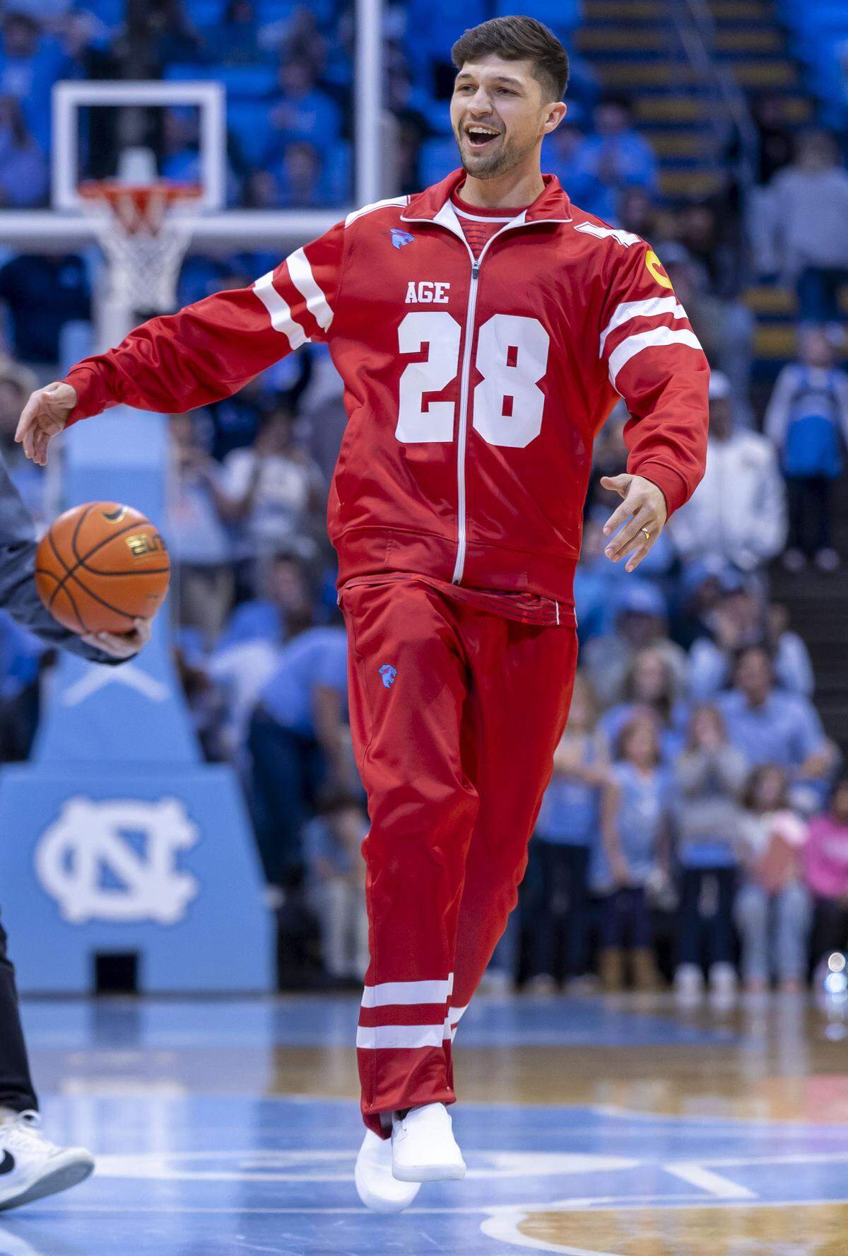 Tyler Gordon of Charlotte, N.C. reacts after winning $250,000 during a contest held by Jimmy Donaldson, the YouTube Influencer MrBeast, on Saturday, December 13, 2025 at the Smith Center in Chapel Hill, N.C.
