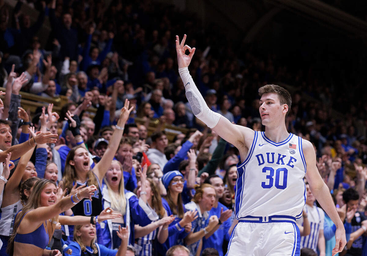 Duke’s Kyle Filipowski reacts after sinking a three-pointer during the second half of the Blue Devils’ 89-68 win over Hofstra on Tuesday, Dec. 12, 2023, at Cameron Indoor Stadium in Durham, N.C.
