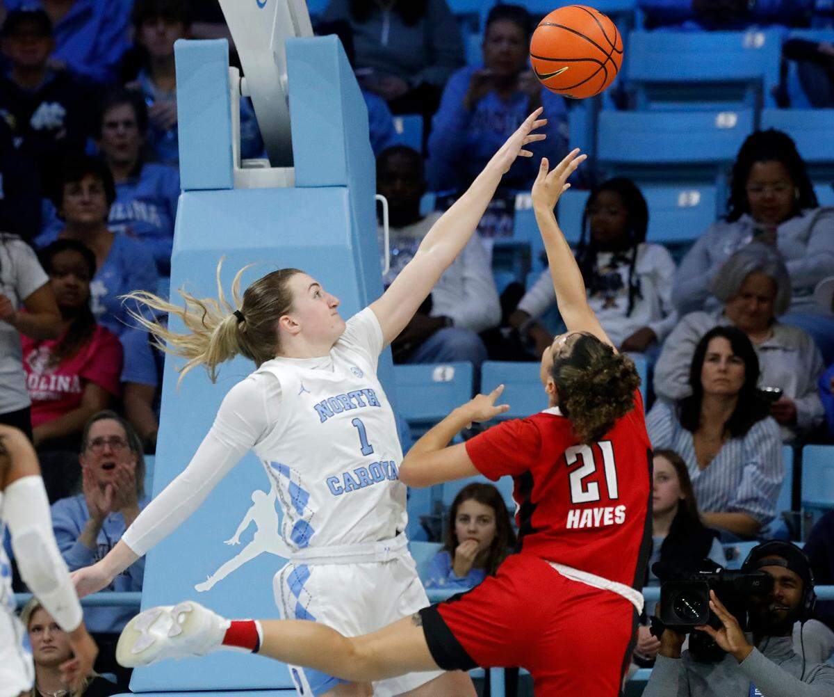 North Carolina’s Alyssa Ustby pressures N.C. State’s Madison Hayes during the first half of the Tar Heels’ game on Thursday, Feb. 22, 2024, at Carmichael Arena in Chapel Hill, N.C.