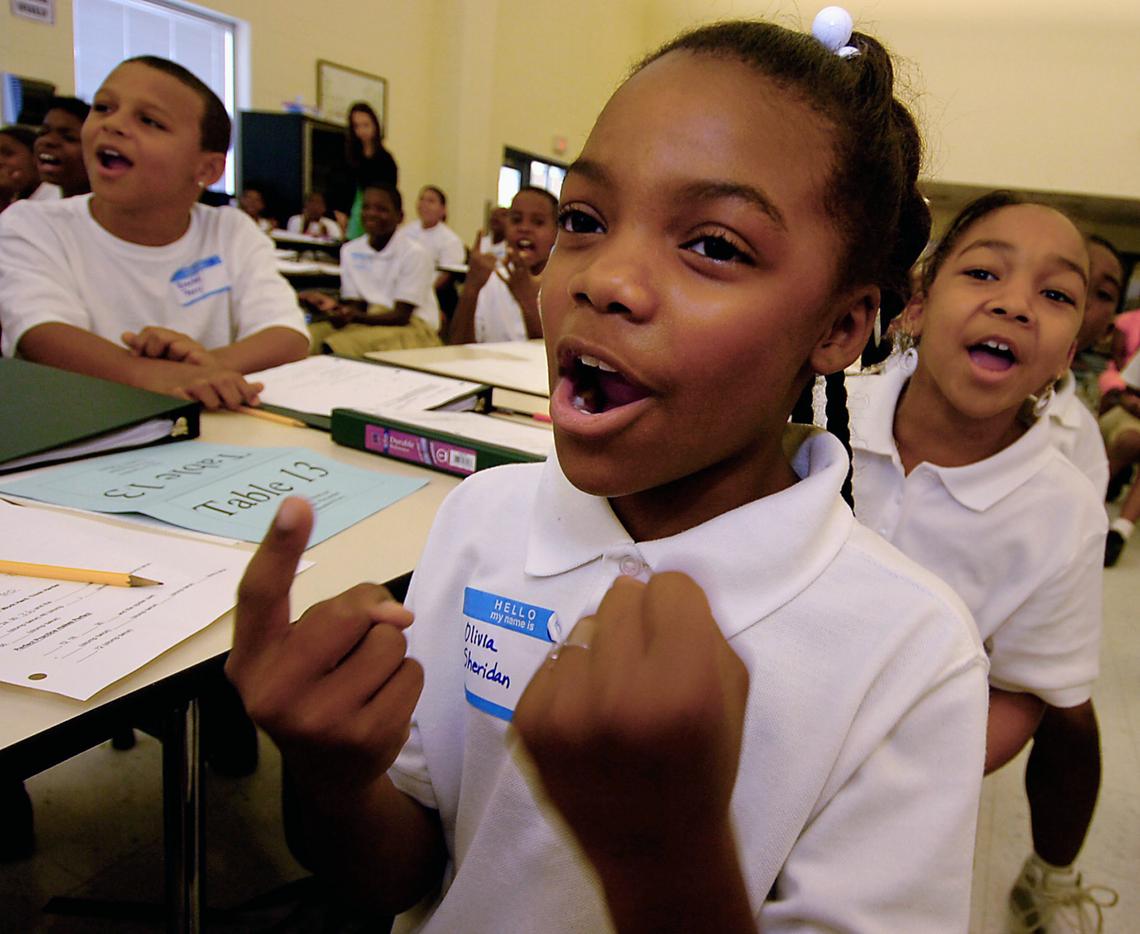 Fifth grader Olivia Sheridan and her classmates loudly sing numbers during an intense program under the leadership of KIPP Academy-Charlotte founder and principal Keith Burnam in this 2007 file photo. KIPP has been approved to offer a teacher training program in North Carolina.