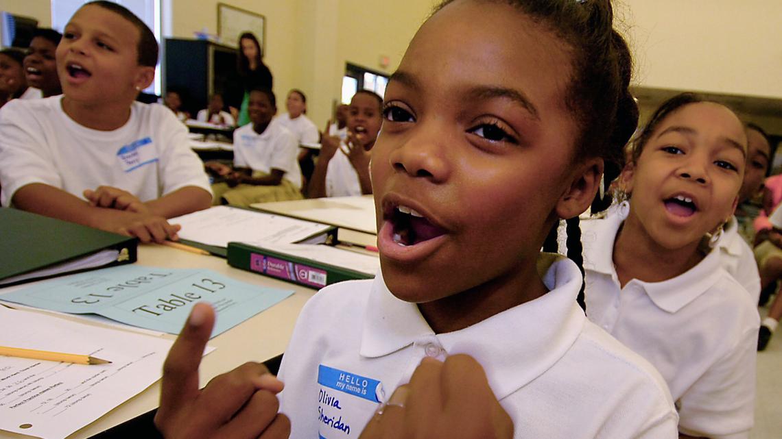 Fifth grader Olivia Sheridan and her classmates loudly sing numbers during an intense program under the leadership of KIPP Academy-Charlotte founder and principal Keith Burnam in this 2007 file photo. KIPP has been approved to offer a teacher training program in North Carolina.