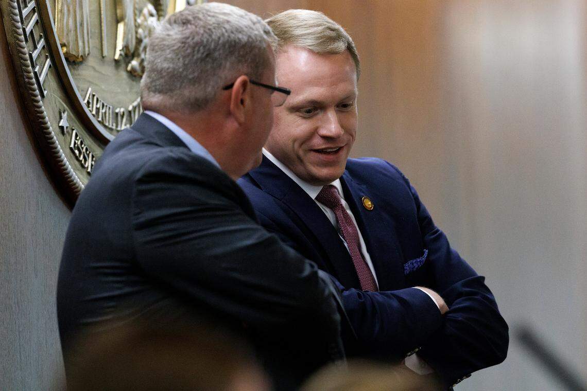 House Speaker Tim Moore speaks with House Speaker-Designate Destin Hall during debate on a bill at the General Assembly on Tuesday, Nov. 19, 2024, in Raleigh, N.C.