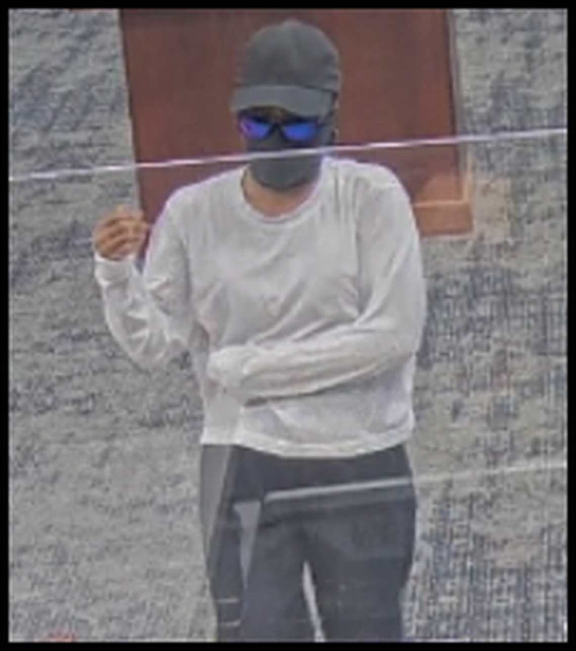 Durham Police included this photo of a suspect who allegedly robbed four banks in Durham. The first one was in October and the most recent in July 2022.