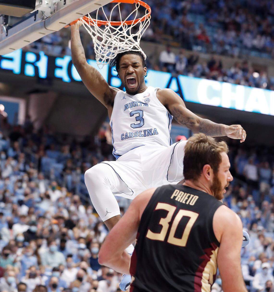 North Carolina’s Dontrez Styles (3) reacts after slamming in two during the second half of UNC’s 94-74 victory over Florida State at the Smith Center in Chapel Hill, N.C., Saturday, Feb. 12, 2022.