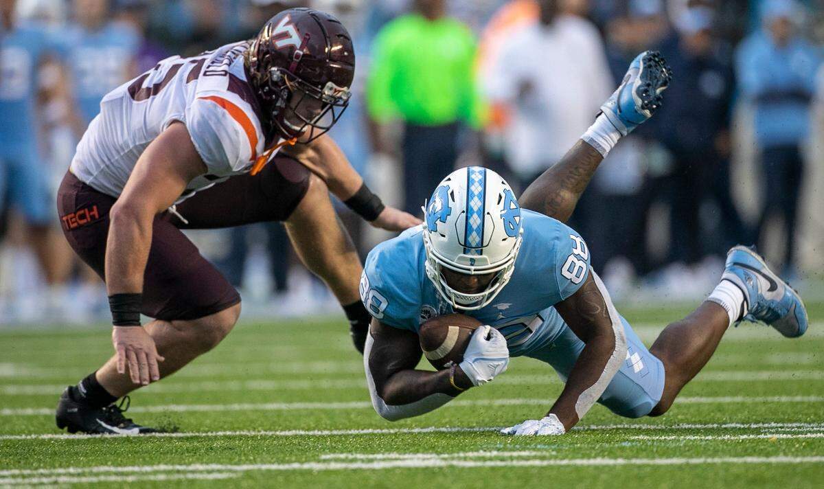 North Carolina’s Kamari Morales (88) gains 25-yards after a reception from quarterback Drake Maye (10) in the fourth quarter against Virginia Tech on Saturday, October 1, 2022 at Kenan Stadium in Chapel Hill, N.C.