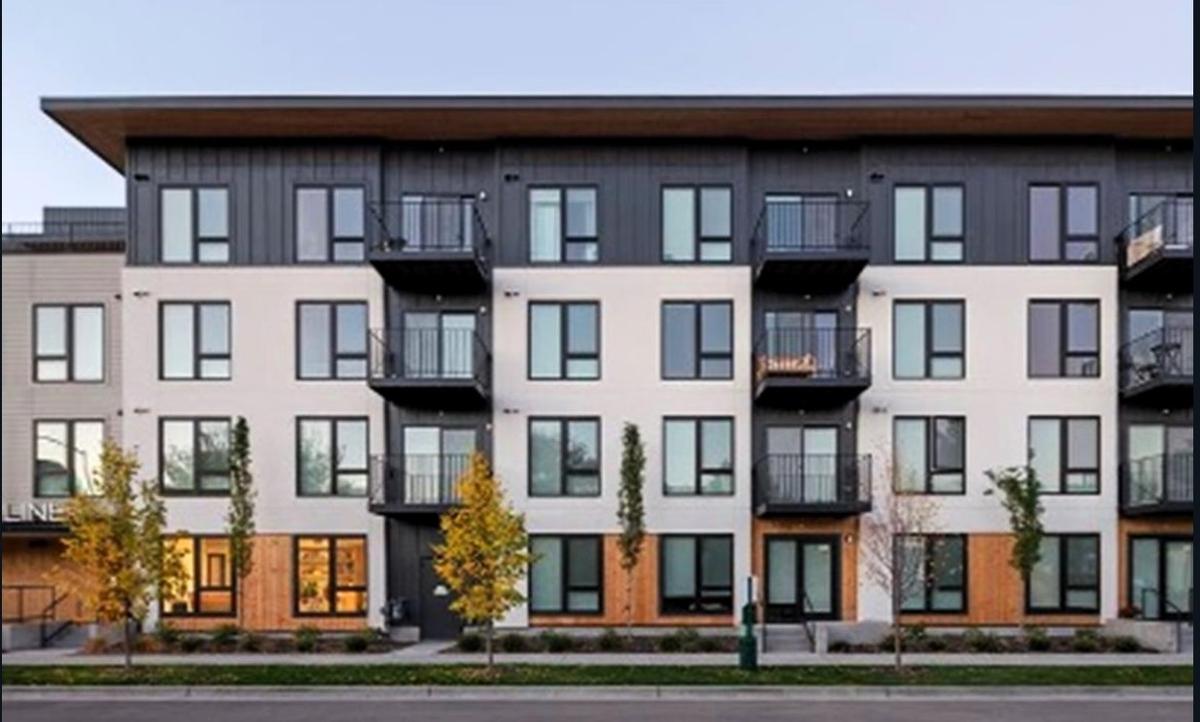 A portion of the apartment building along Old Chapel Hill Road in the 11 White Oak development will have a flat roof to reduce the visual height of the building from surrounding properties.