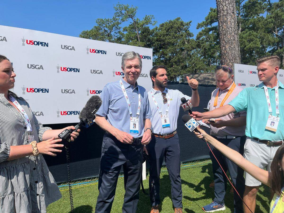 North Carolina Governor Roy Cooper speaks at the U.S. Open golf tournament at Pinehurst Resort and Country Club on Thursday, June 13, 2024.