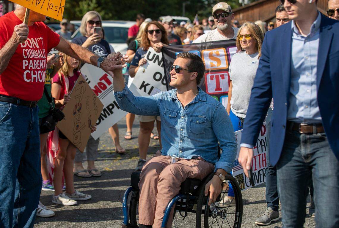 U.S. Rep. Madison Cawthorn arrives for the Johnston County Board of Education meeting on Tuesday, September 14, 2021 in Smithfield, N.C. Cawthorn came to urge the school district to end the face covering mandate for students.