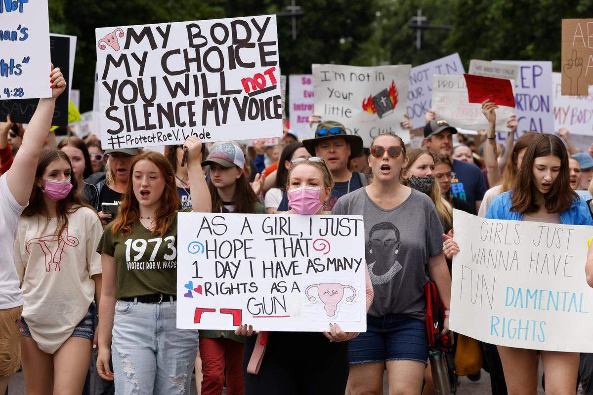 Abortion rights protesters march through downtown Raleigh, N.C. during the Bans Off Our Bodies abortion rights march and rally Saturday, May 14, 2022.