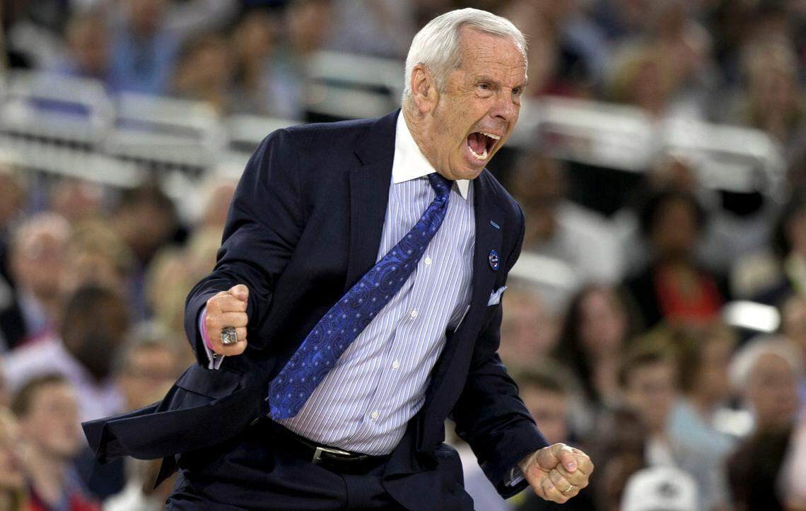 North Carolina head coach Roy Williams is pumped after a basket by North Carolina’s Marcus Paige (5) to put UNC up by 12 during the second half of UNC’s 83-66 victory over Syracuse in the semifinals of the 2016 NCAA Division I Men’s Basketball Championship at NRG Stadium in Houston, Texas, Saturday, April 2, 2016.