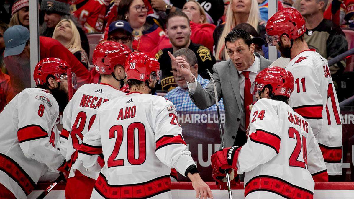 Down 2-0 in the first period, Carolina Hurricanes coach Rod Brind’Amour talks with his team during a time out in Game 4 of the Eastern Conference Finals against the Florida Panthers on Wednesday, May 24, 2023 at FLA Live Arena in Sunrise, Fla.