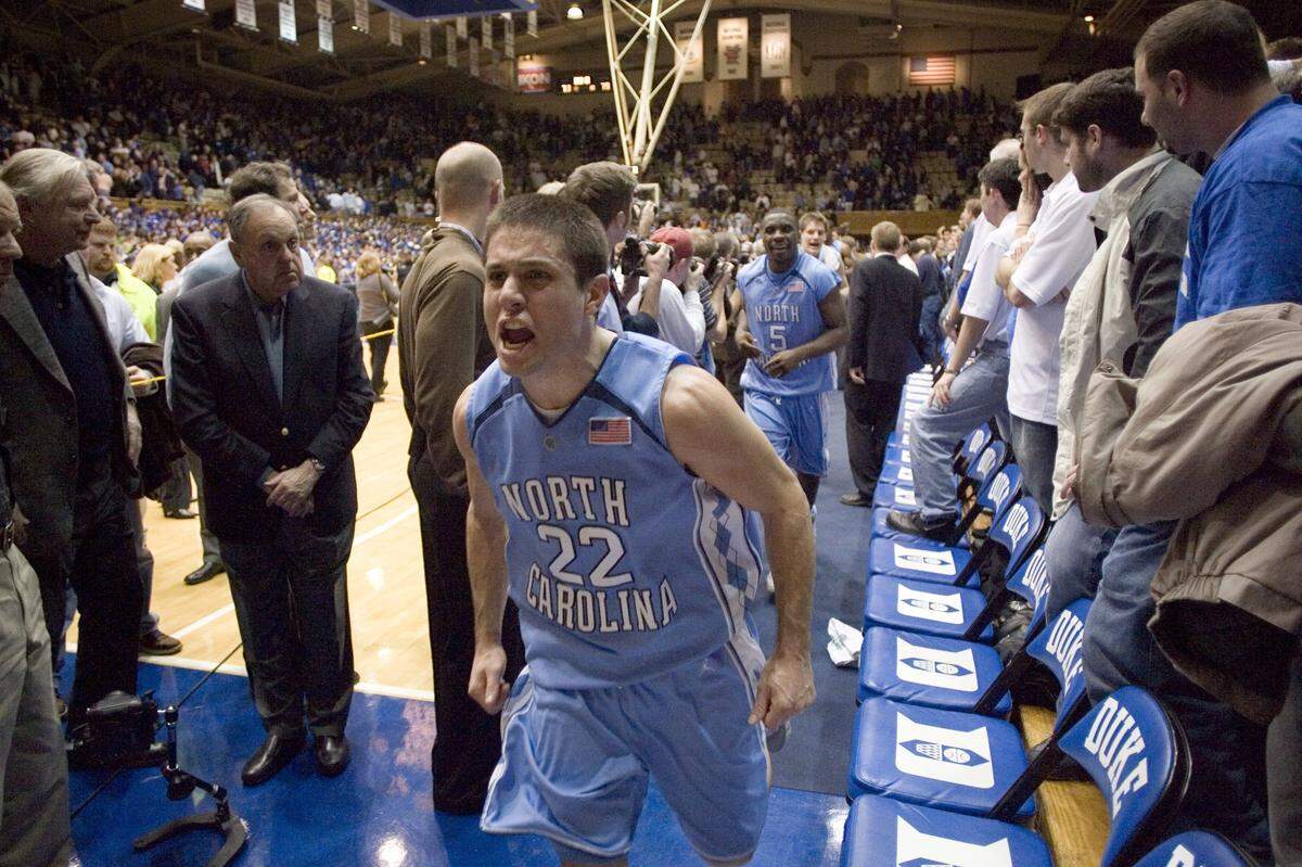UNC’s Wes Miller (22) lets out a victory yell as he makes his way to the locker room following UNCÕs 79-73 victory over Duke on Wednesday Feb. 7, 2007, in Cameron Indoor Stadium.  