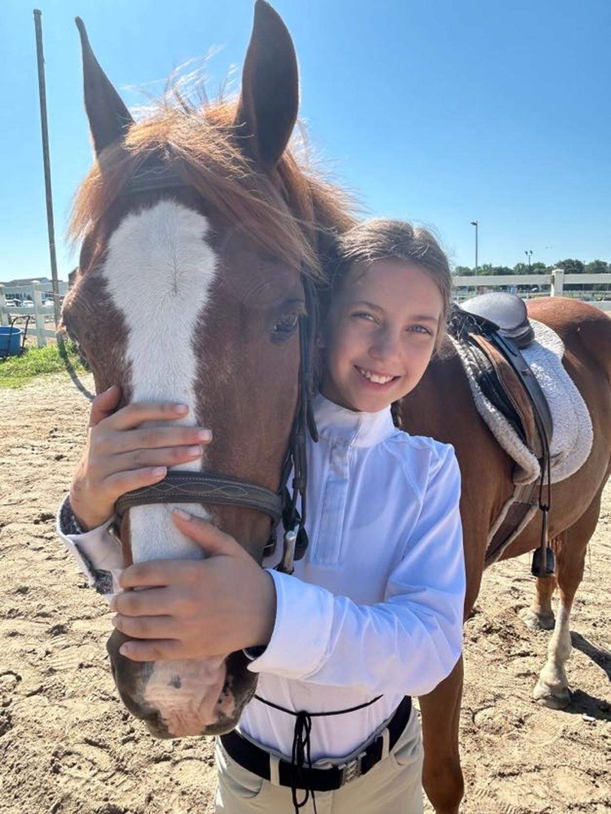 Brooklyn Carroll, 10, with Chester, a horse she often rode during lessons, in 2025. Carroll was killed in a boating crash on Harris Lake on Aug. 2, 2025.