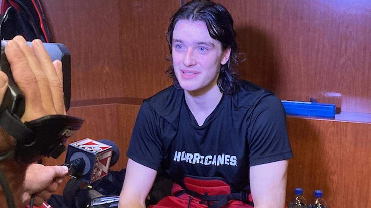Defenseman Dominik Badinka answers media questions after on-ice drills at the Carolina Hurricanes prospects development camp on July 9, 2024.