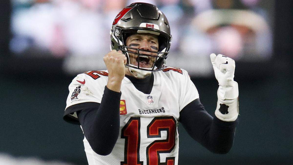 Tampa Bay Buccaneers quarterback Tom Brady reacts after winning the NFC championship NFL football game against the Green Bay Packers in Green Bay, Wis., Sunday, Jan. 24, 2021. The Buccaneers defeated the Packers 31-26 to advance to the Super Bowl.