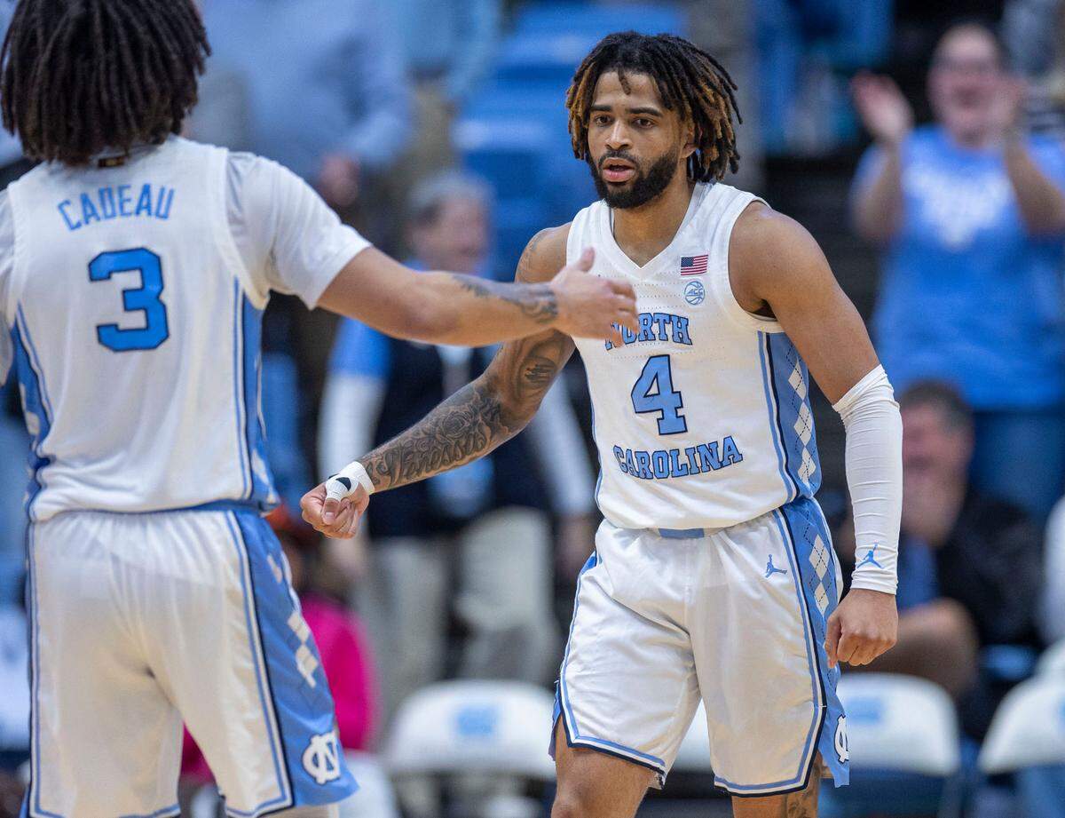 North Carolina guard R.J. Davis (4) reacts after sinking a two point basket with 51.2 seconds to play, to give the Tar Heels a 67-66 lead and ultimately secure the victory over Pitt on Saturday, February 8, 2025 at the Smith Center in Chapel Hill, N.C.