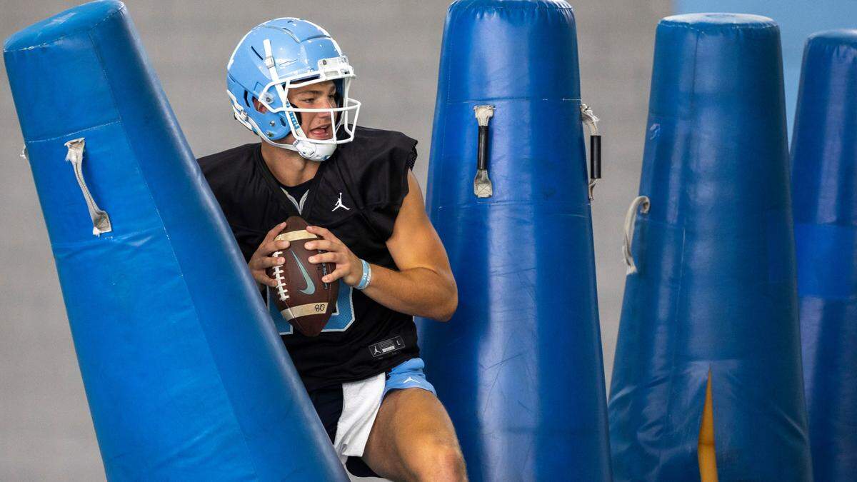 North Carolina quarterback Drake Maye (10) works on a footwork and mobility drill at the Tar Heels’ first practice of the season on Wednesday, August 2, 2023 in Chapel Hill, N.C.