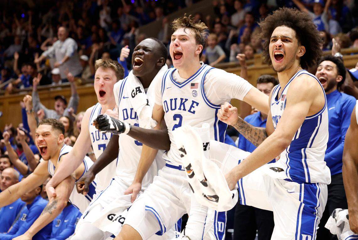 From left Duke’s Mason Gillis (18), Kon Knueppel (7), Khaman Maluach (9), Cooper Flagg (2) and Tyrese Proctor (5) celebrate a basket by Spencer Hubbard during the second half of Duke’s 107-56 exhibition victory over Lincoln (Pa) University at Cameron Indoor Stadium in Durham, N.C., Saturday, Oct. 19, 2024.
