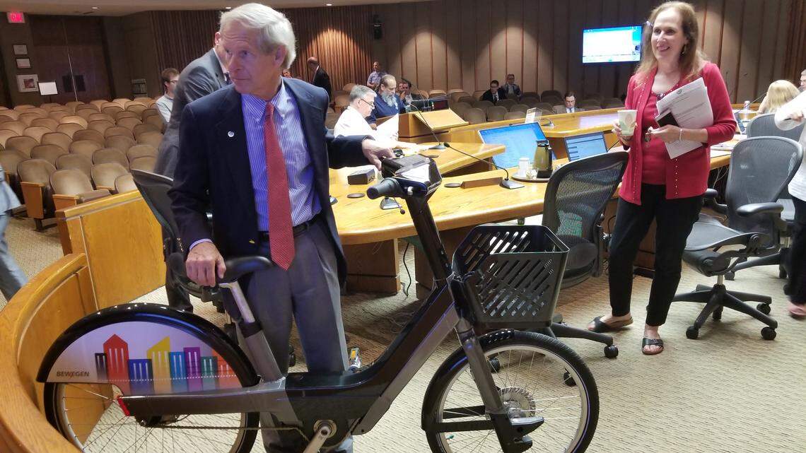 Raleigh City Council members, including Dickie Thompson, left, and Stef Mendell, get a firsthand look at the bikes for the Raleigh Bikeshare in this file photo.