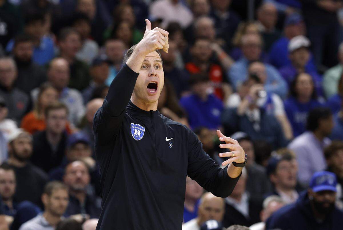 Duke head coach Jon Scheyer yells to his players during the second half of Duke’s 71-65 victory over Siena in the first round of the NCAA Men’s Basketball Tournament at Bon Secours Wellness Arena in Greenville, S.C., Thursday, March 19, 2026.