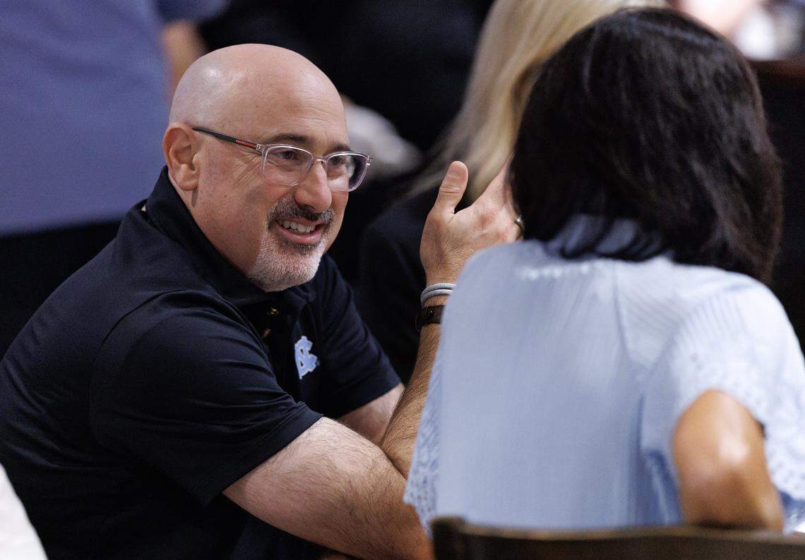 Steve Newmark (left) talks during a break in the “Carolina Football Live” radio show at Top of the Hill Restaurant & Brewery on Wednesday, Aug. 27, 2025, in Chapel Hill, N.C.