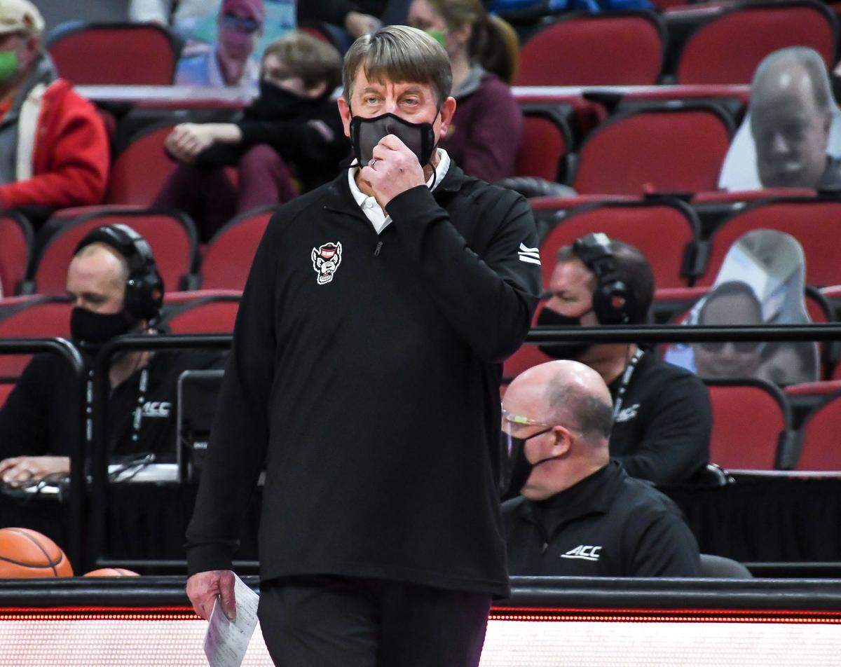 N.C. State’s head coach Wes Moore watches during the Wolfpack’s game against Louisville at KFC Yum! Center in Louisville, Ky. Monday, February 1, 2021.