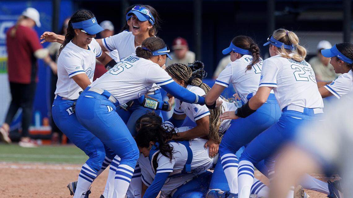 Duke players celebrate following the Blue Devils’ 6-3 win over Florida State in the ACC Tournament final on Saturday, May 11, 2024, in Durham, N.C.